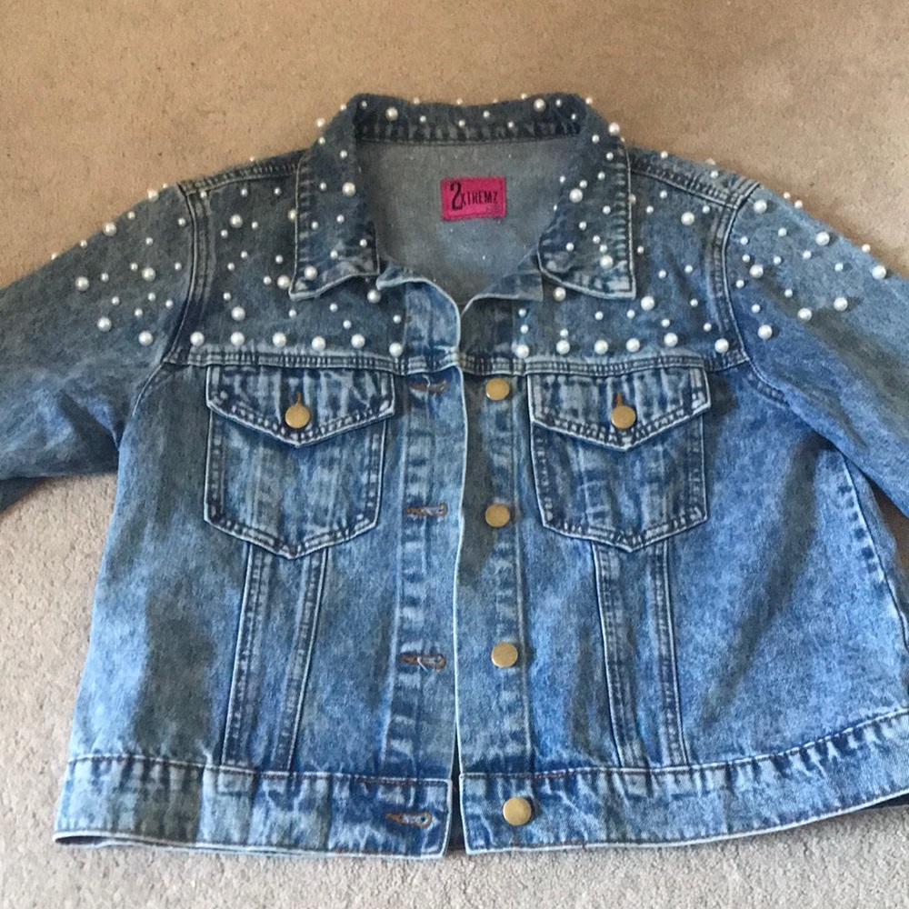 A denim jacket with rhime stones